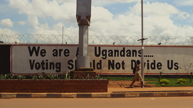 "We are all Ugandans....voting should not divide us." Poster in Uganda, 2012. Photo by pixelthing via Flickr (CC BY-SA 2.0)